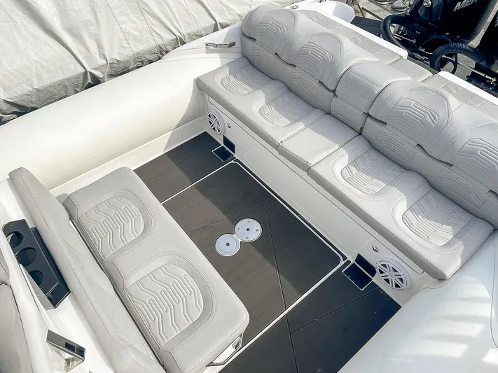  Yacht Photos Pics Luxurious seating area on a 2025 Ribco Venom 30 boat with modern design.