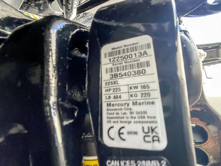  Yacht Photos Pics Label on Mercury Marine engine, model 225XL, with specifications and serial number.
