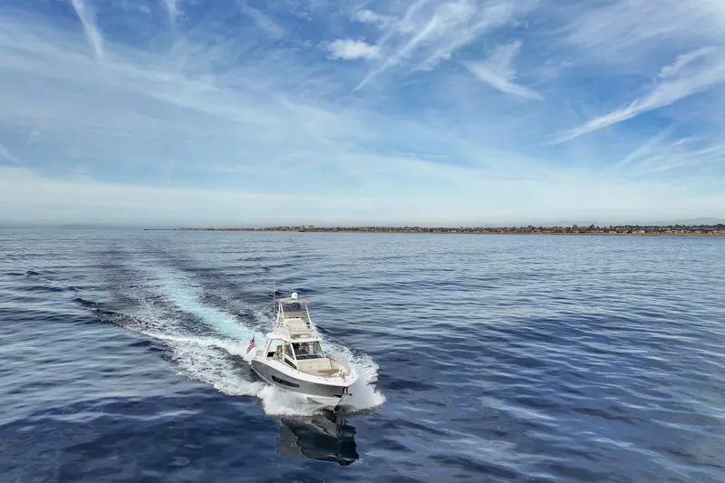 Fan Tail III Yacht Photos Pics 2018 Boston Whaler 420 Outrage cruising on open water under a clear sky.