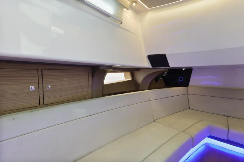 Fan Tail III Yacht Photos Pics Interior of 2018 Boston Whaler 420 Outrage, featuring modern seating and ambient lighting.