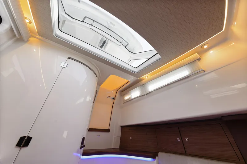 Fan Tail III Yacht Photos Pics 2018 Boston Whaler 420 Outrage cabin interior with modern lighting and sleek design.