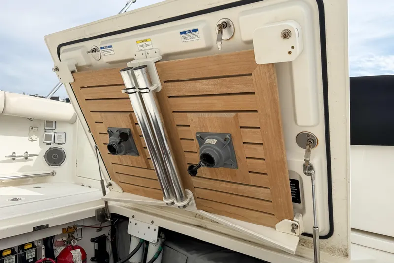 Fan Tail III Yacht Photos Pics 2018 Boston Whaler 420 Outrage boat interior with wooden panel and equipment.