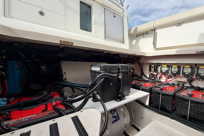 Fan Tail III Yacht Photos Pics 2018 Boston Whaler 420 Outrage engine compartment with batteries and wiring.