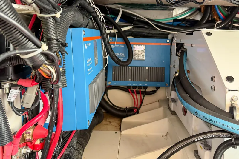 Fan Tail III Yacht Photos Pics Engine room of 2018 Boston Whaler 420 Outrage with electrical components and wiring.