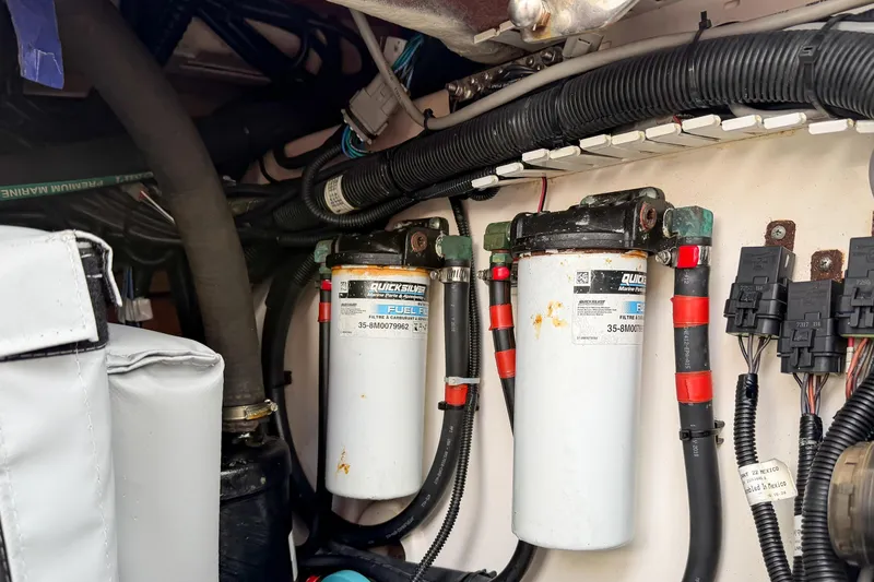 Fan Tail III Yacht Photos Pics Engine compartment of a 2018 Boston Whaler 420 Outrage with fuel filters and wiring.