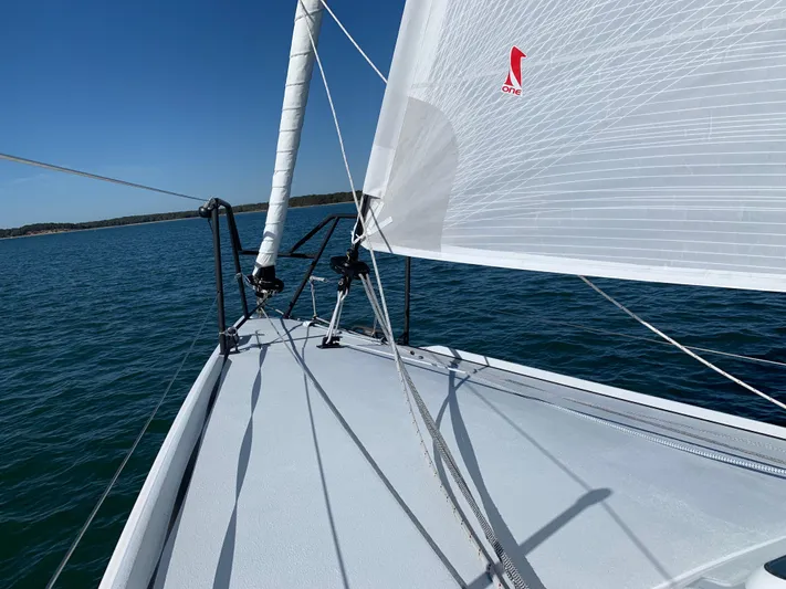 Ace Yacht Photos Pics 2019 J Boats J/121 sailboat on open water, showcasing deck and sails.