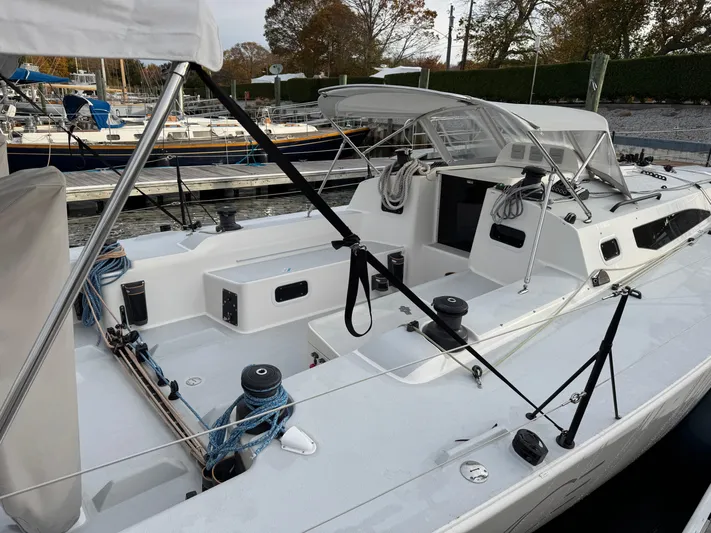 Ace Yacht Photos Pics 2019 J Boats J/121 sailboat docked, featuring a spacious cockpit and modern design.