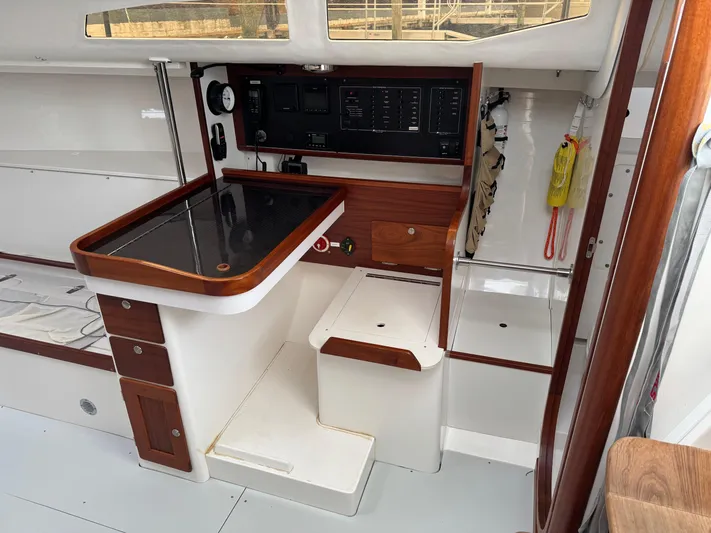 Ace Yacht Photos Pics 2019 J Boats J/121 interior with navigation station and control panel.