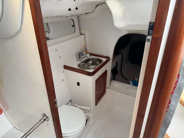 Ace Yacht Photos Pics 2019 J Boats J/121 yacht interior with compact bathroom and sink.