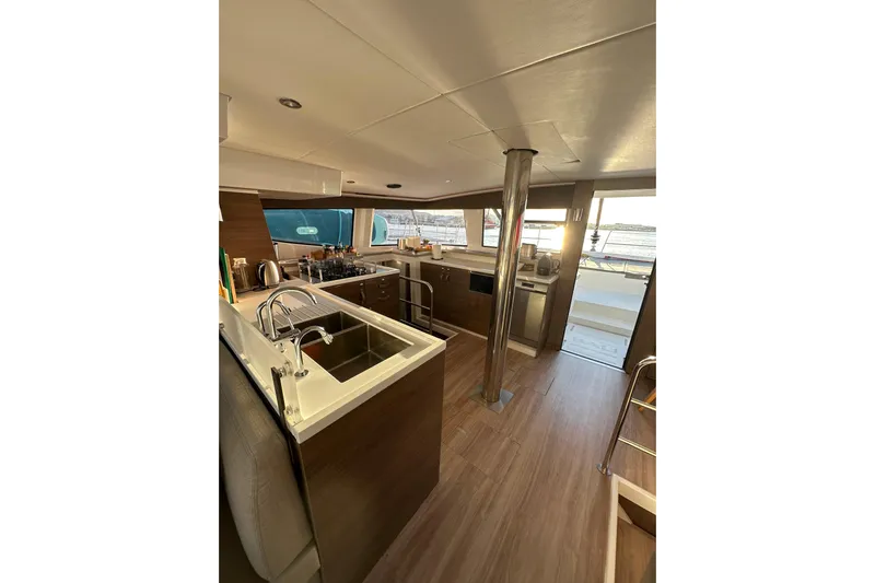 Platinum Yacht Photos Pics Modern kitchen interior on 2023 Bali 4.6 yacht with sleek design and ocean view.