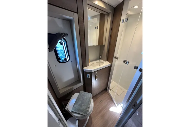 Platinum Yacht Photos Pics Modern bathroom in 2023 Bali 4.6 yacht, featuring sleek design and compact functionality.