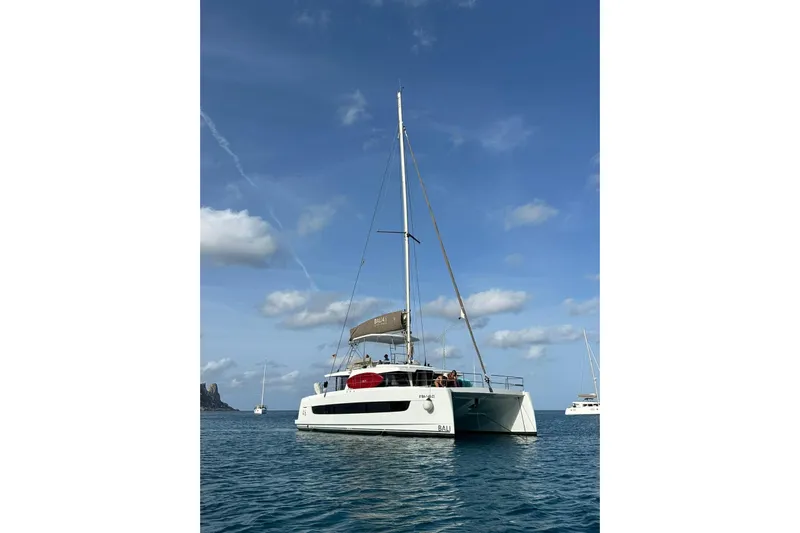 Platinum Yacht Photos Pics 2023 Bali 4.6 catamaran sailing on clear blue waters under a sunny sky.