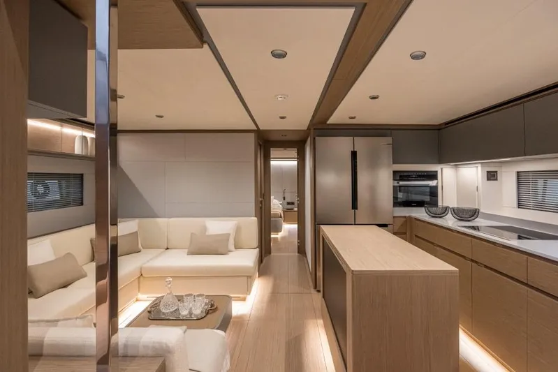  Yacht Photos Pics Luxurious interior of 2026 Pardo Yachts GT75 with modern kitchen and cozy seating area.