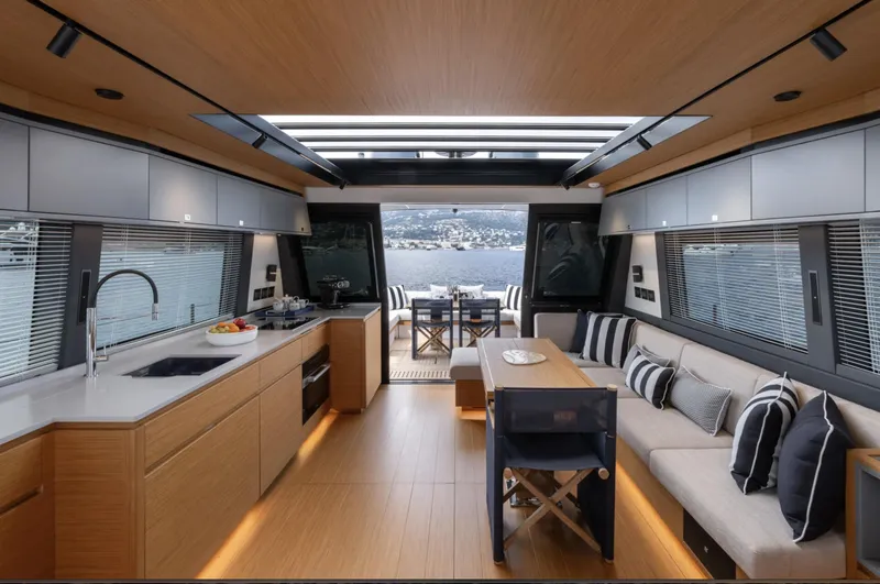  Yacht Photos Pics Luxurious interior of 2026 Pardo Yachts GT75 with modern kitchen and seating area.