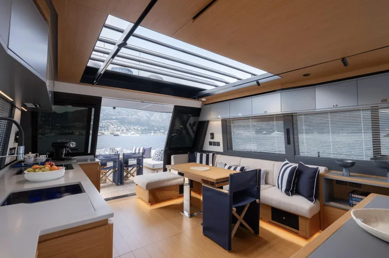  Yacht Photos Pics Luxurious interior of 2026 Pardo Yachts GT75 with modern kitchen and seating area.