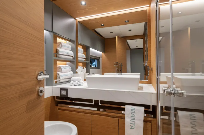  Yacht Photos Pics Luxurious bathroom in 2026 Pardo Yachts GT75, featuring modern design and elegant wood finishes.