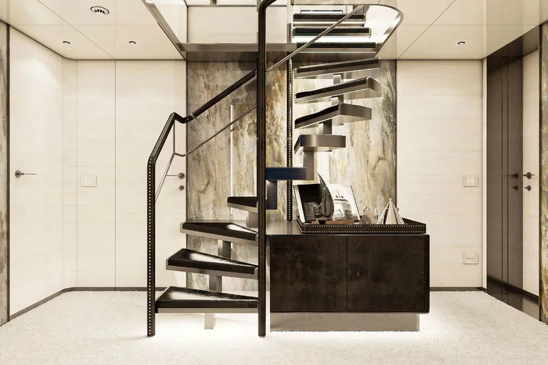  Yacht Photos Pics Modern spiral staircase in luxurious 2025 Columbus Yachts Atlantique interior.