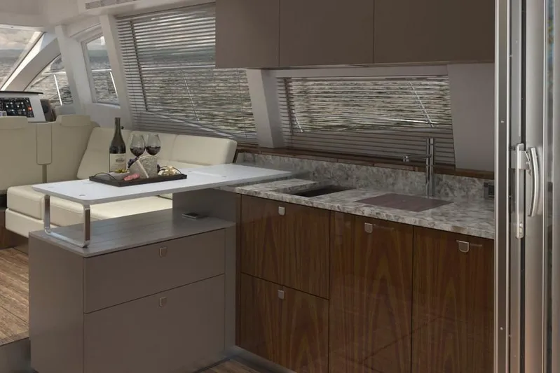  Yacht Photos Pics Luxurious interior of 2018 Sea Ray Fly 520 yacht with modern kitchen and seating area.