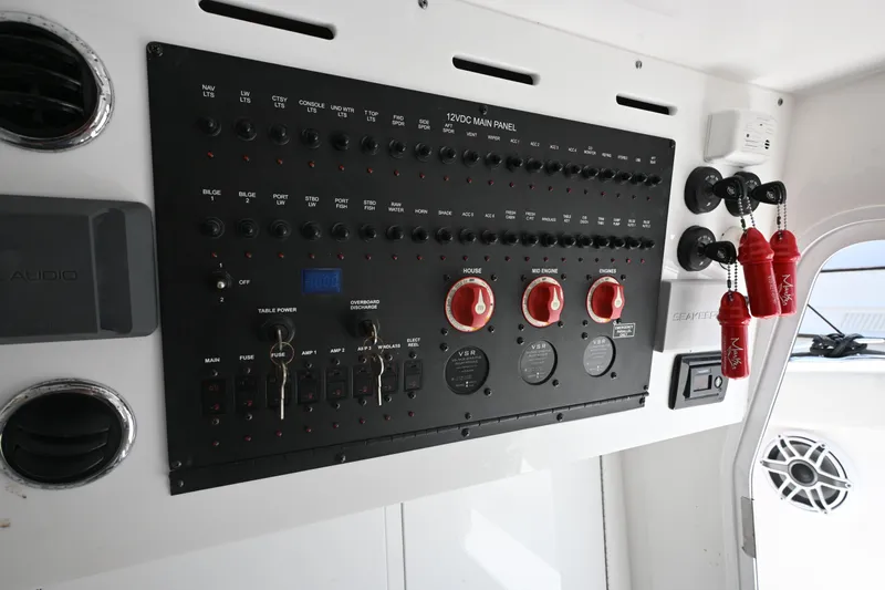  Yacht Photos Pics Control panel of 2023 Tidewater 380 CC Adventure boat with switches and gauges.