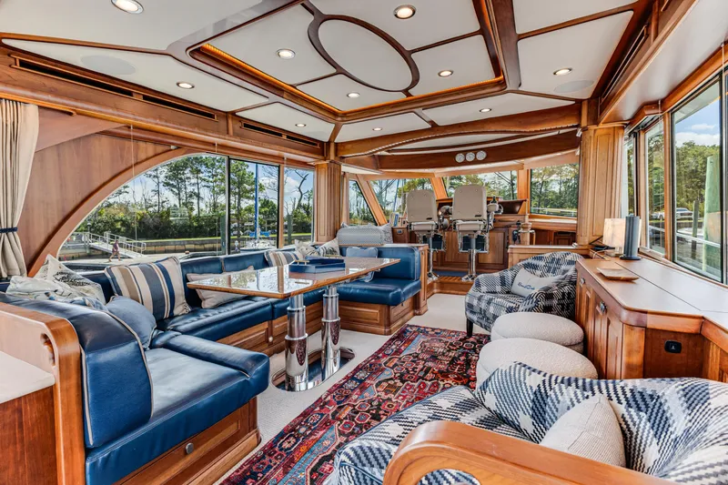Sandcrab Yacht Photos Pics Luxurious interior of 2018 Sabre 66 Dirigo yacht with elegant seating and wood finishes.