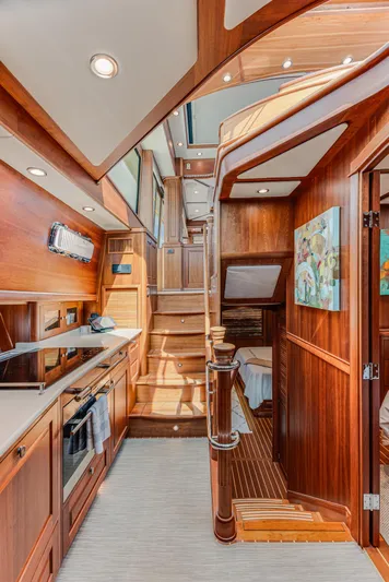 Sandcrab Yacht Photos Pics Luxurious interior of 2018 Sabre 66 Dirigo yacht with elegant wood finishes.