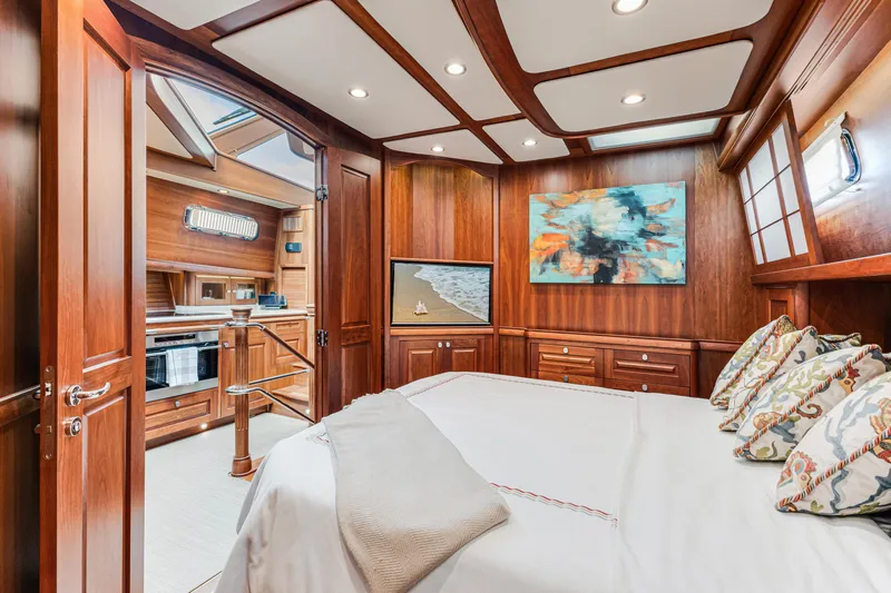 Sandcrab Yacht Photos Pics Luxurious 2018 Sabre 66 Dirigo yacht interior with elegant wood paneling and cozy bedroom.