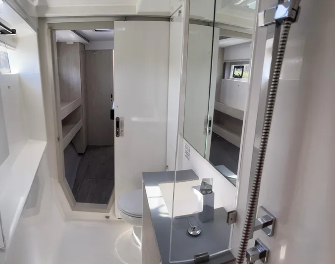 Seventeen Yacht Photos Pics Modern bathroom interior of 2020 Leopard 50 yacht with sleek fixtures and ample storage.
