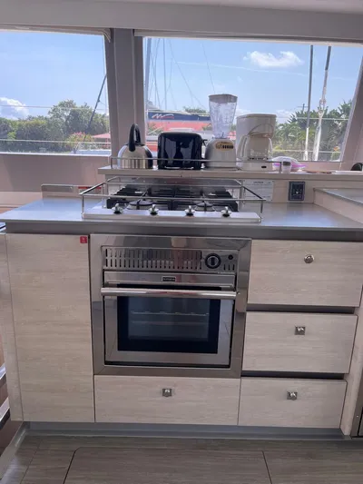 Seventeen Yacht Photos Pics Modern kitchen in a 2020 Leopard 50 yacht with stove and oven.