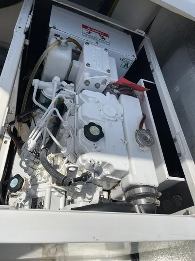 Seventeen Yacht Photos Pics Leopard 50 2020 engine compartment with mechanical components and wiring.