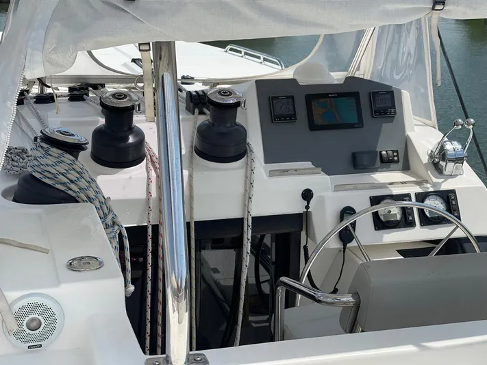 Seventeen Yacht Photos Pics Cockpit of a 2020 Leopard 50 yacht with navigation equipment and steering wheel.