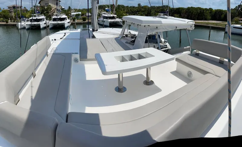 Seventeen Yacht Photos Pics Leopard 50 yacht 2020 model with spacious deck and seating area in marina.