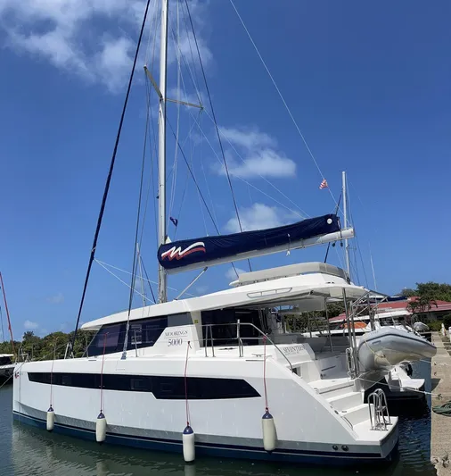 Seventeen Yacht Photos Pics Leopard 50 catamaran yacht docked at marina, 2020 model.