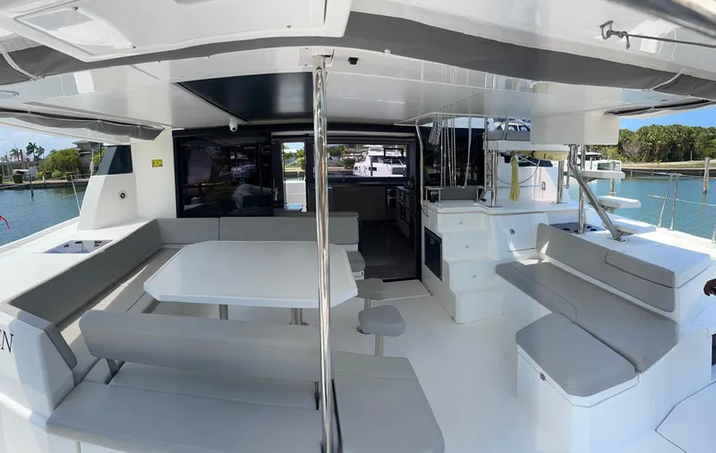 Seventeen Yacht Photos Pics Leopard 50 yacht 2020 model, spacious outdoor seating and dining area.