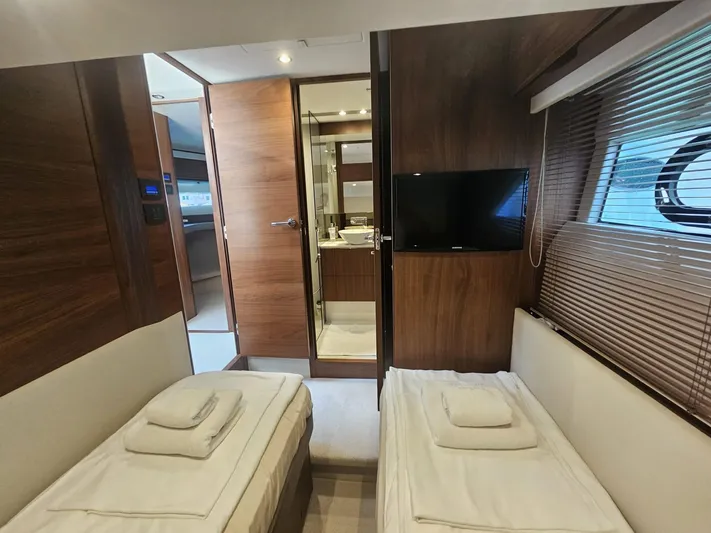  Yacht Photos Pics Luxurious 2020 Princess F62 yacht cabin with twin beds and modern amenities.