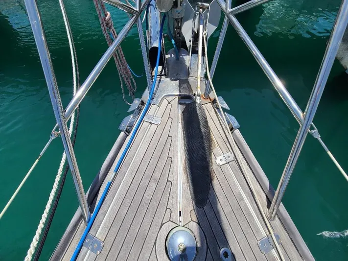 Taita I Yacht Photos Pics Bow of a 2001 Comet 54 DH yacht with stainless steel railings.