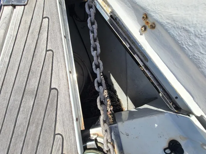 Taita I Yacht Photos Pics Anchor chain compartment on a 2001 Comet 54 DH sailboat deck.