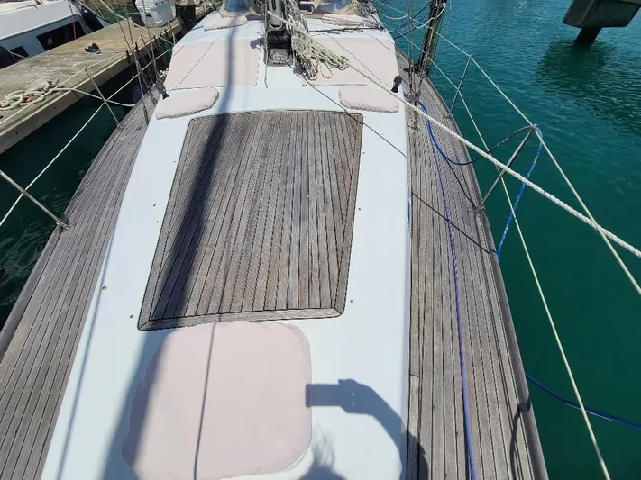 Taita I Yacht Photos Pics Deck view of 2001 Comet 54 DH sailboat with wooden panels and ropes.