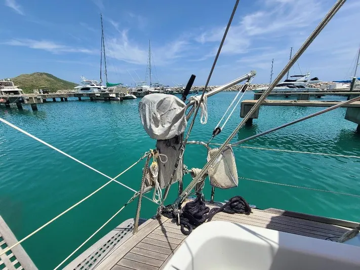 Taita I Yacht Photos Pics Sailboat docked in marina, clear blue water, Comet 54 DH, 2001 model.