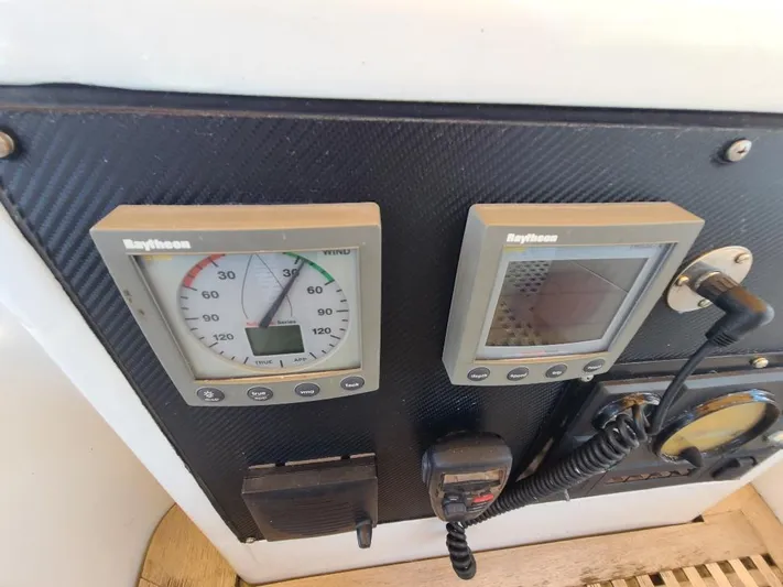 Taita I Yacht Photos Pics Control panel of a 2001 Comet 54 DH boat with Raytheon instruments.