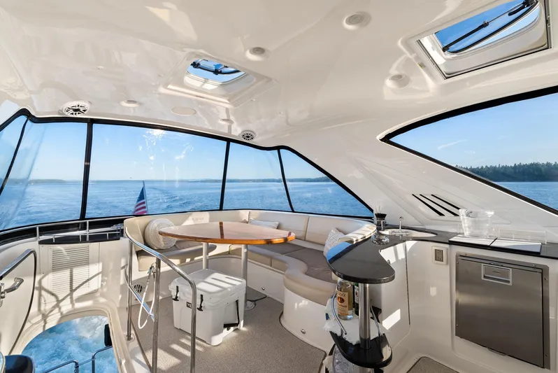  Yacht Photos Pics Luxurious interior of 2012 Meridian 541 Sedan yacht with panoramic ocean views.