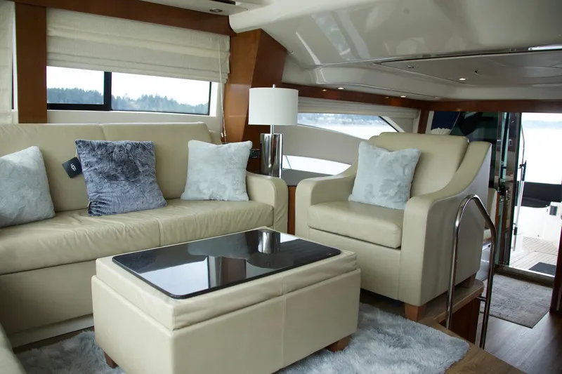  Yacht Photos Pics Luxurious interior of 2012 Meridian 541 Sedan yacht with elegant seating and decor.