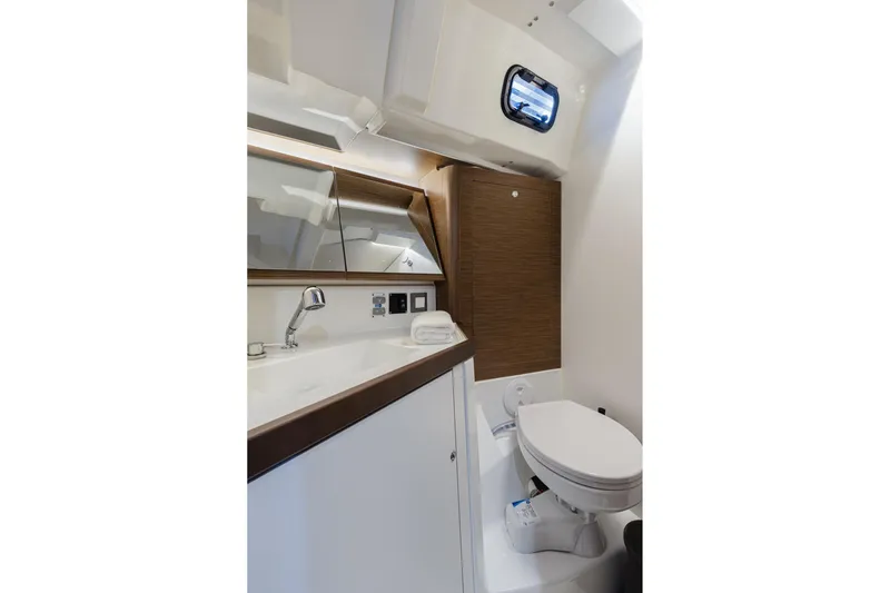  Yacht Photos Pics Bathroom interior of 2020 Beneteau Oceanis 46.1 yacht, featuring modern fixtures and compact design.