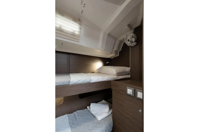  Yacht Photos Pics Interior of 2020 Beneteau Oceanis 46.1 yacht with cozy bunk beds and modern design.
