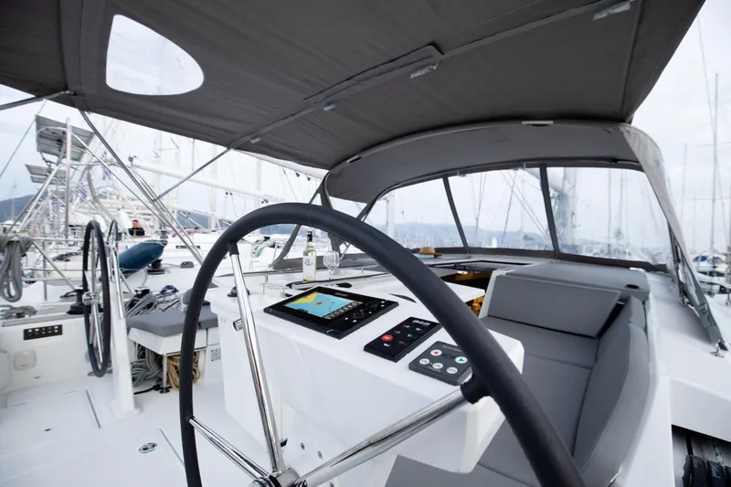  Yacht Photos Pics Cockpit view of 2020 Beneteau Oceanis 46.1 sailboat with modern navigation equipment.