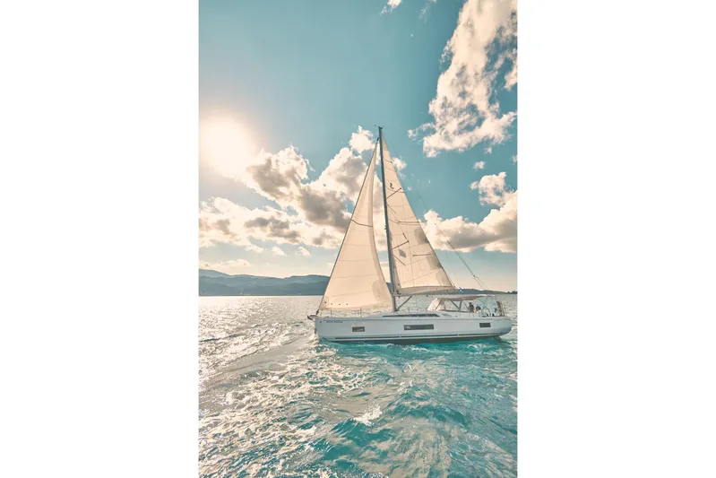  Yacht Photos Pics 2020 Beneteau Oceanis 46.1 sailing on a sunny day with clear skies.