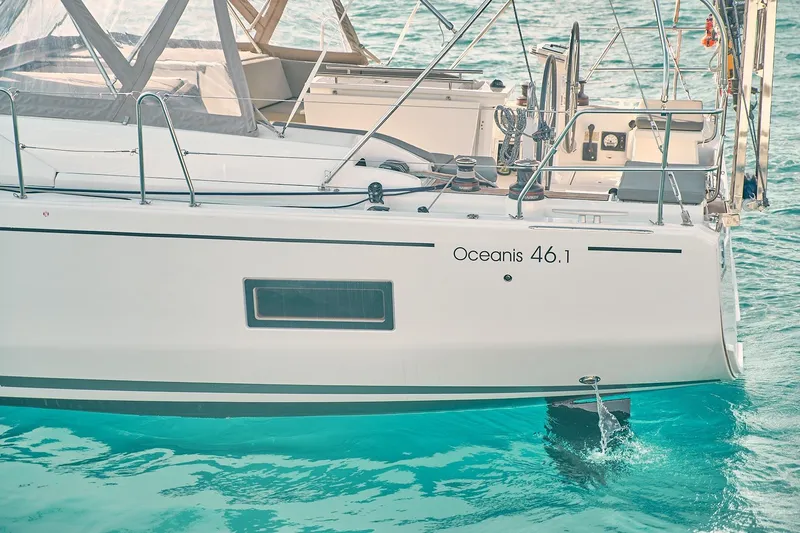  Yacht Photos Pics 2020 Beneteau Oceanis 46.1 yacht on turquoise water, showcasing sleek design and modern features.