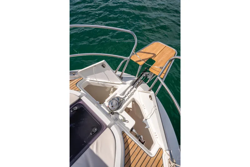  Yacht Photos Pics Bow view of 2025 Beneteau Antares 11 Fly with anchor and teak deck.