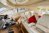 Luxurious interior of 2008 Astondoa Open 53 yacht with plush seating and modern controls.