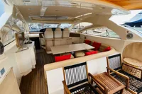 Luxurious 2008 Astondoa Open 53 yacht interior with elegant seating and wooden accents.