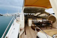 Astondoa Open 53 yacht, 2008 model, featuring spacious deck and elegant seating area.